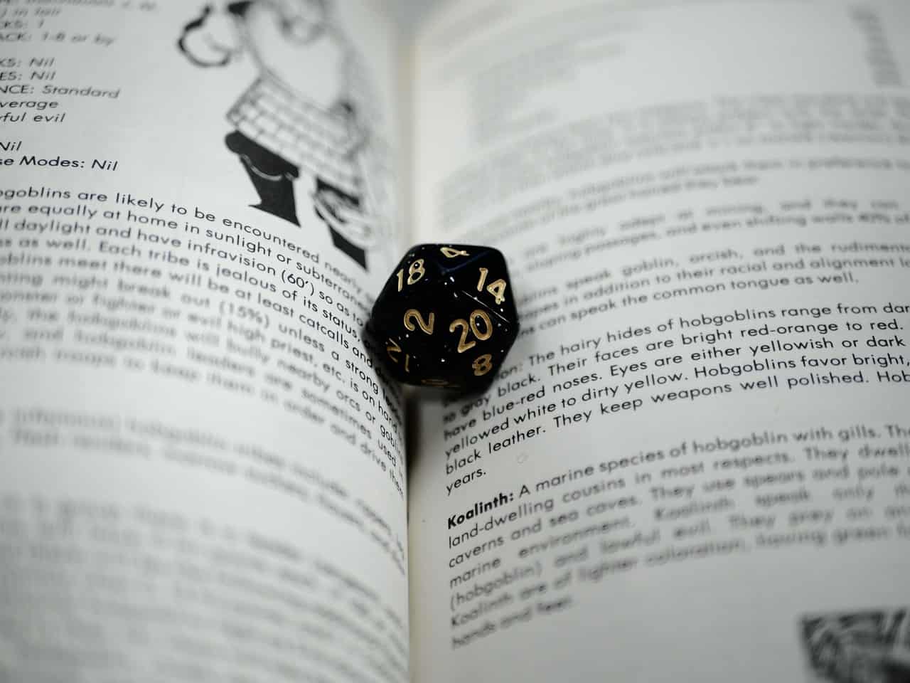 Dice sitting on top of a dungeons and dragons open book