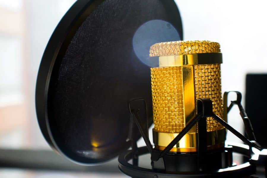 golden microphone with pop filter