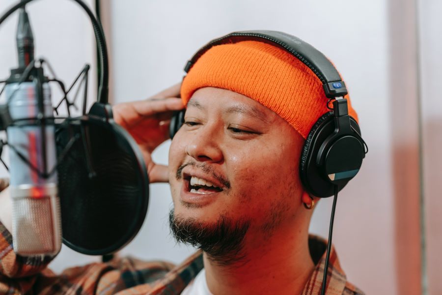 man wearing podcasting headphones