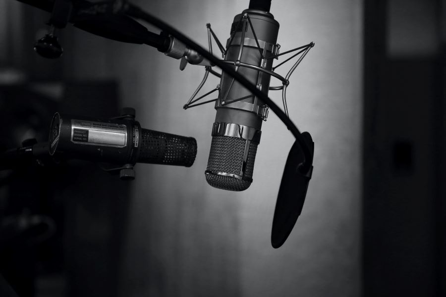 black and white image of podcast mic setup