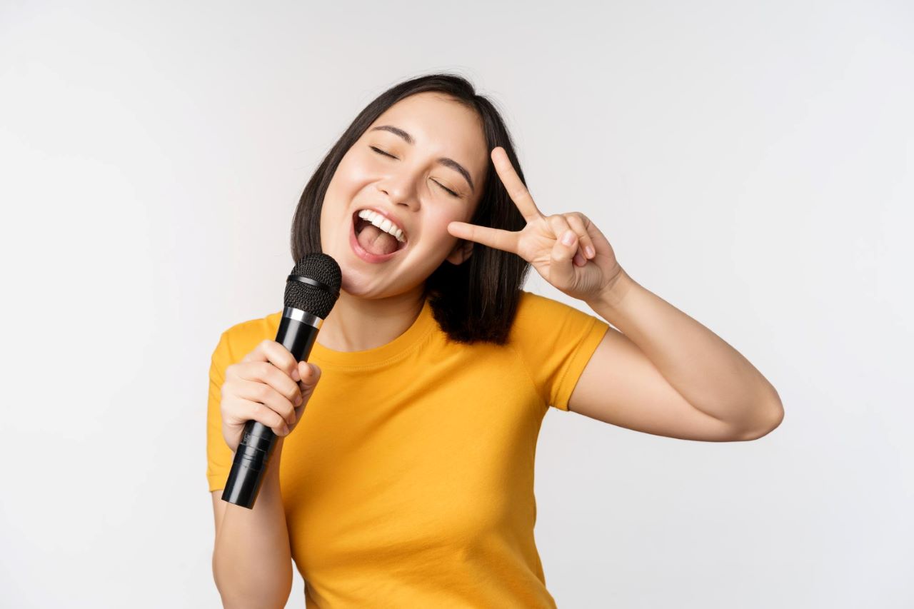 How to make your voice deeper on mic: Regular vocal exercises, specifically those that train and stretch your vocal cords, play a pivotal role.
